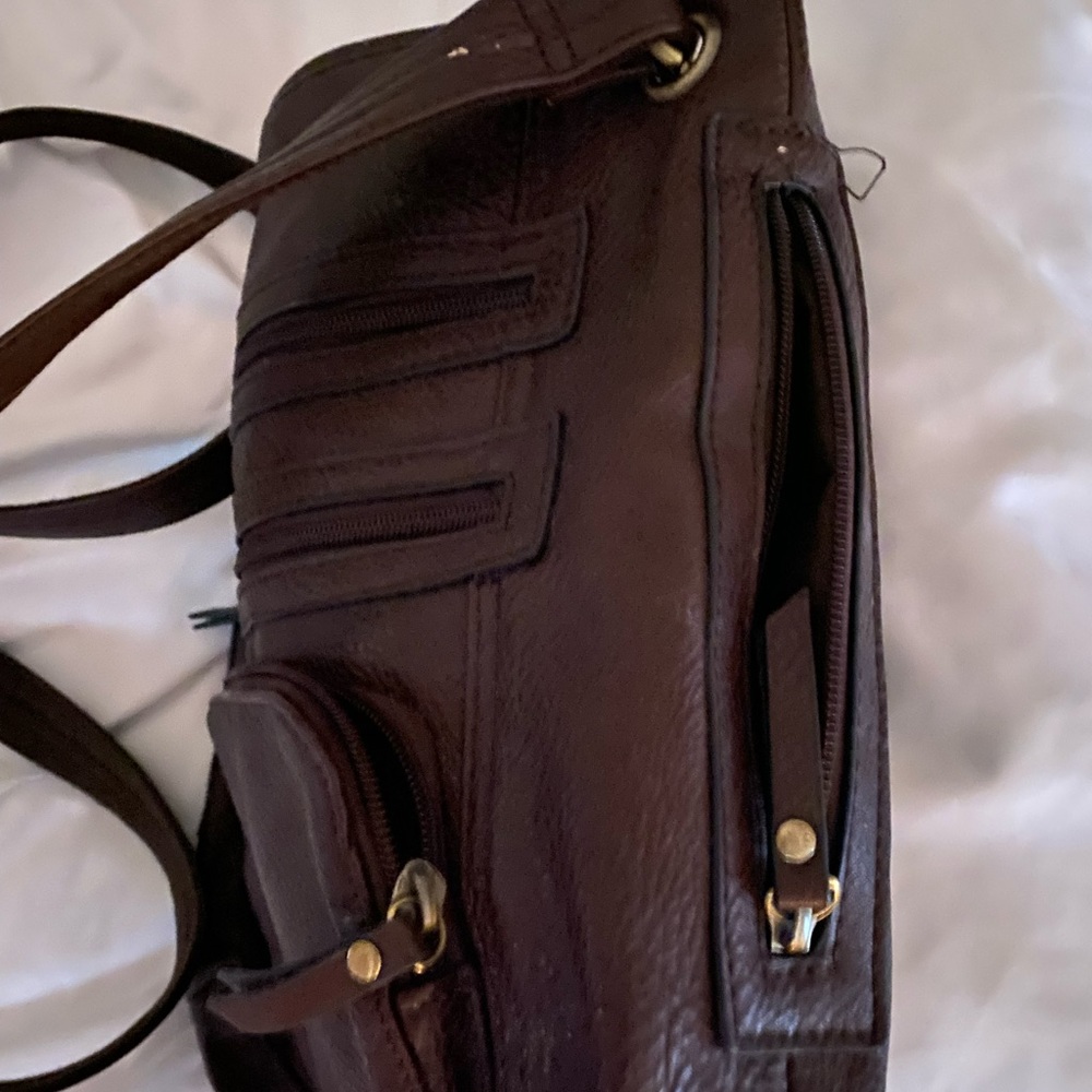 Concealed weapon purse. Like new. Brown leather.